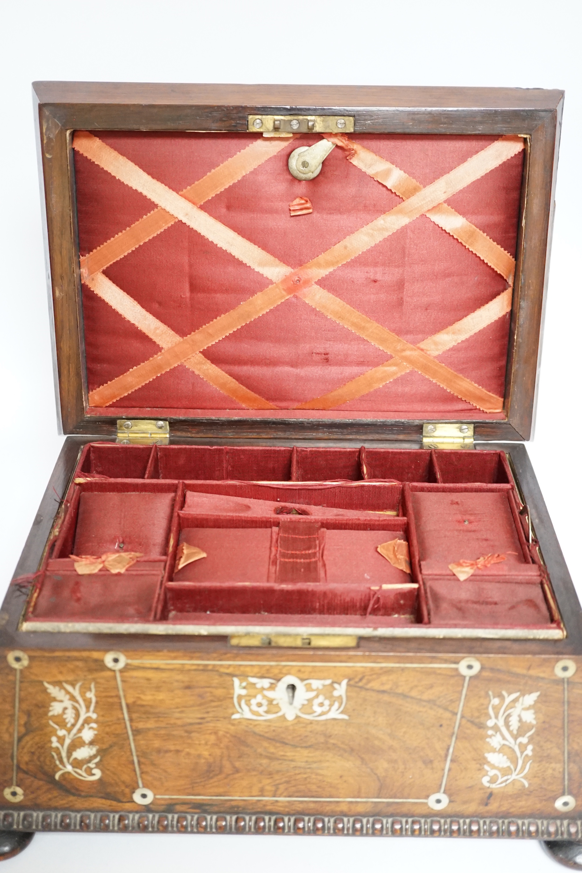 A William IV mother of pearl inlaid rosewood jewellery casket, 30cm wide